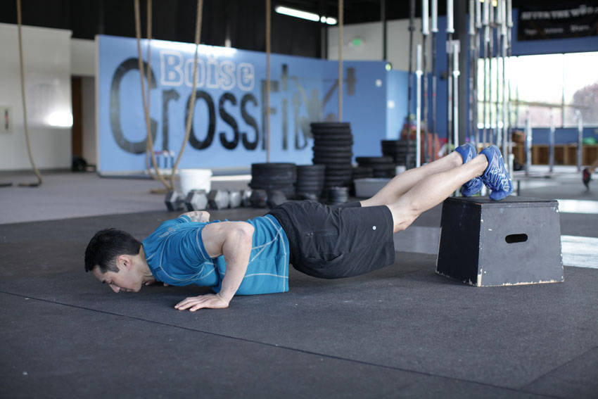 Pompes lestées déclinées - position finale