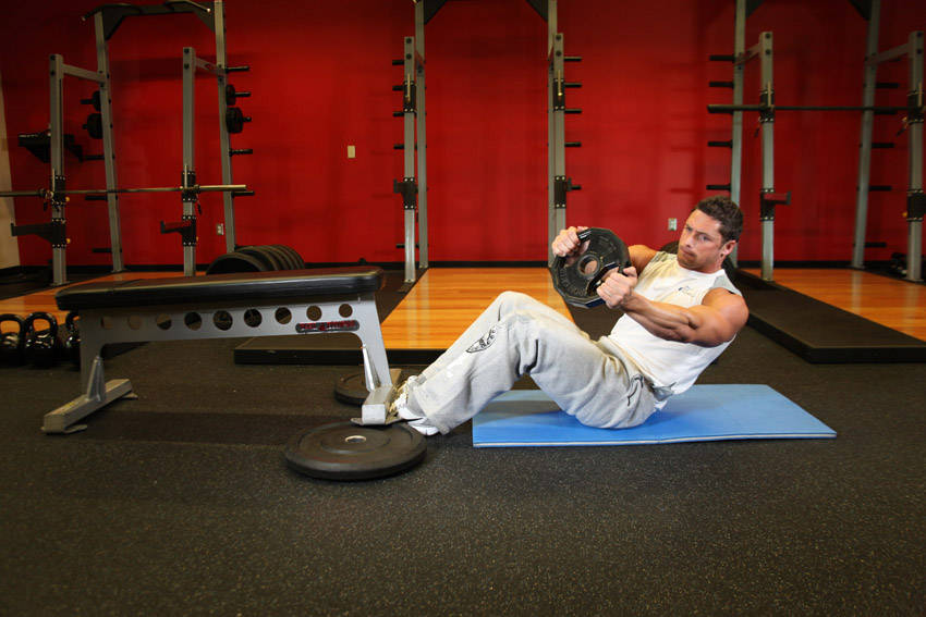 Russian twist haltère - position finale